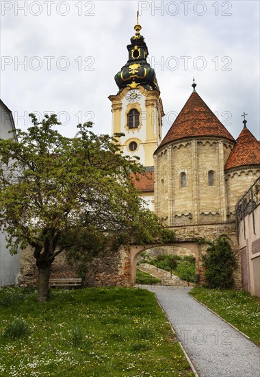 Hartberg charnel house with city parish church in the background