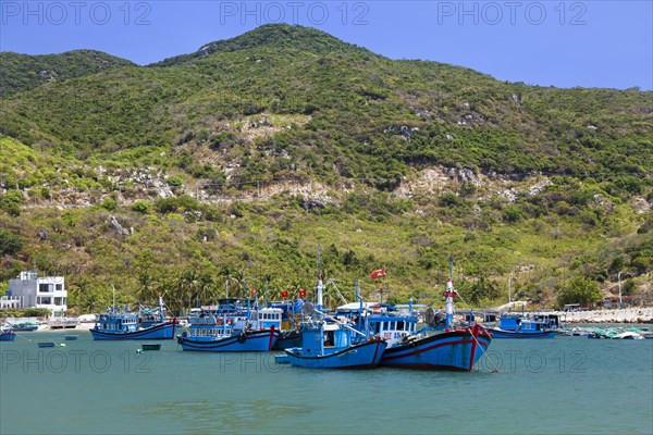 Coastal landscape with fishing boats