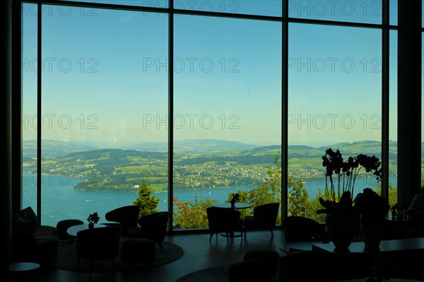 Hotel Five Stars Buergenstock with Restaurant over Lake Lucerne and Mountain in Sunny Day in Buergenstock