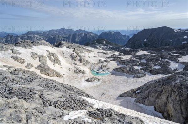 Rocky plateau with remnants of snow