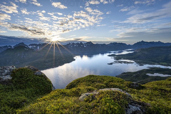 View of Fjord Raftsund and mountains in the evening light