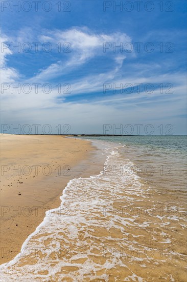 Long sandy beach on a little islet in Marinho Joao Vieira e Poilao National Park