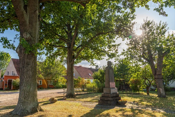 Village square with war memorial for the fallen of the world wars