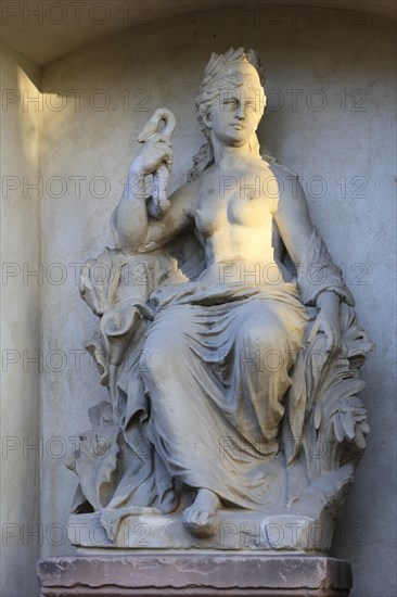 Statue of a half-naked woman behind the former sulphur bathhouse