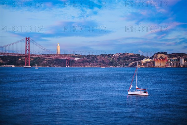 View of 25 de Abril Bridge over Tagus river