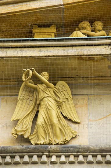 Sculpture of an angel holding a victor's wreath at the Neue Wache