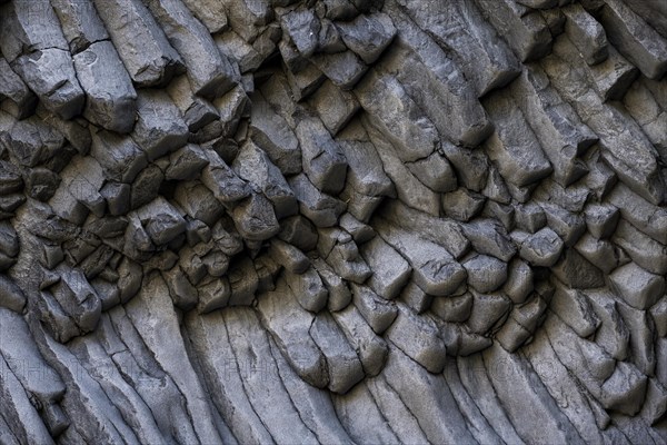 Rock formations of basalt and lava rock in the river park Gole dell' Alcantara