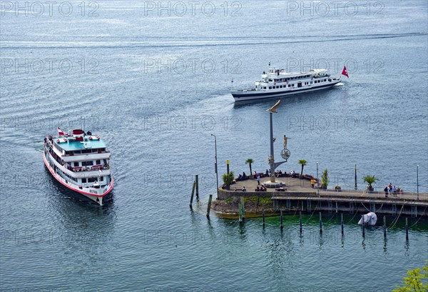 Harbour pier with Magic Column by artist Peter Lenk