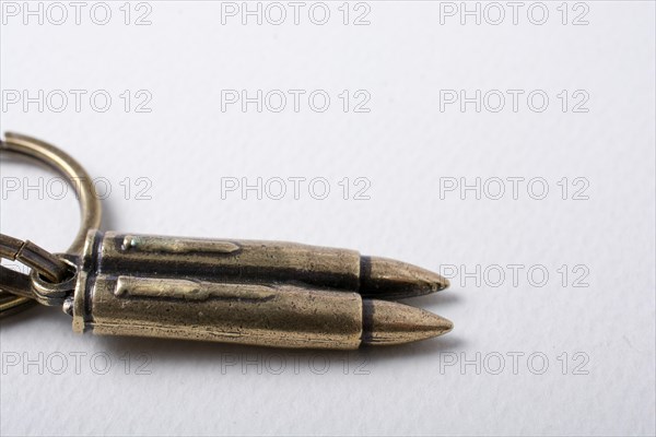 Bullet on white background as against the war conceptual photography