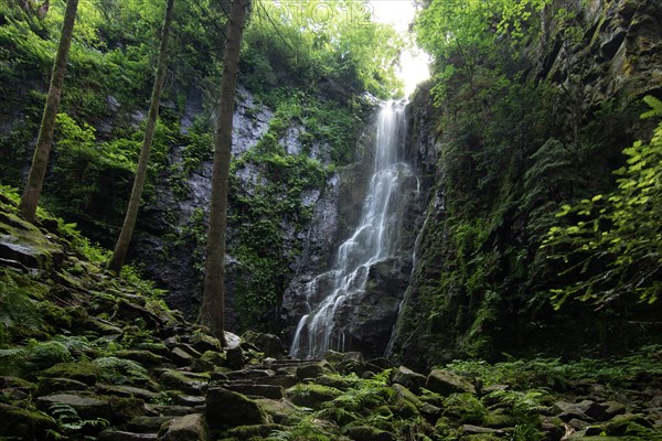 Landscape shot of the Burgbach waterfall