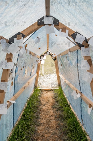 Tunnel with wishlists on Easter path