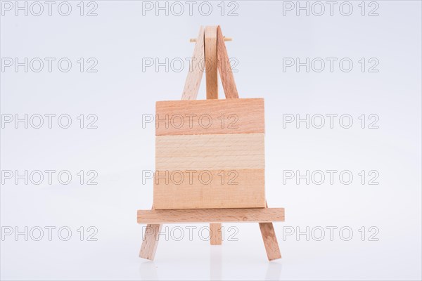 Building blocks put on tripod for painting on white background