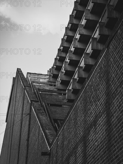 Elevation of the modern concrete and brick building