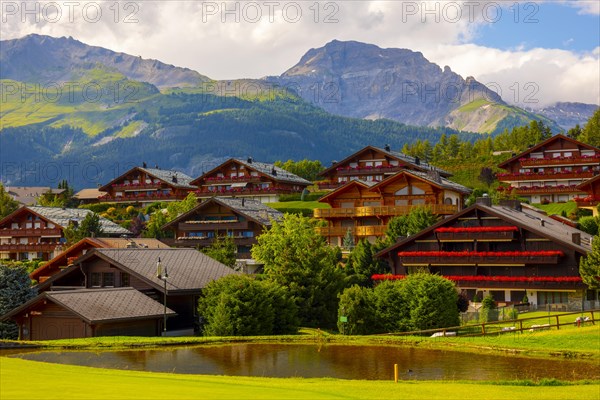 Crans Sur Sierre Golf Course with House and Mountain View in Crans Montana in Valais