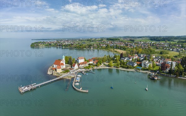 Aerial view of the moated castle peninsula on Lake Constance with the baroque church of St. George