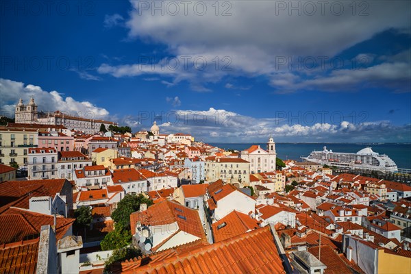 View of Lisbon famous postcard view from Miradouro de Santa Luzia tourist viewpoint over Alfama old city district