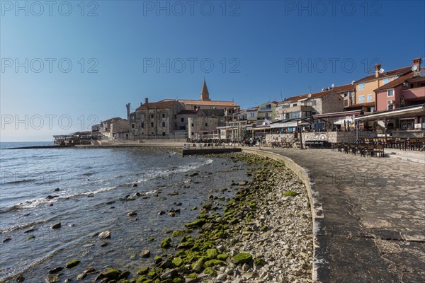 Beach and city view of the coastal town of Umag