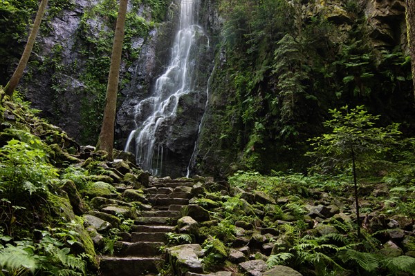 Landscape shot of the Burgbach waterfall