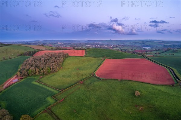 Sunset over Fields and Farms from a drone