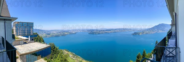 Panoramic View from Hotel Balcony with Mountain View in a Sunny Summer Day in Burgenstock