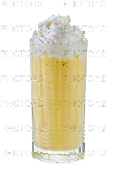 Pineapple milkshake with whipped cream isolated on white background