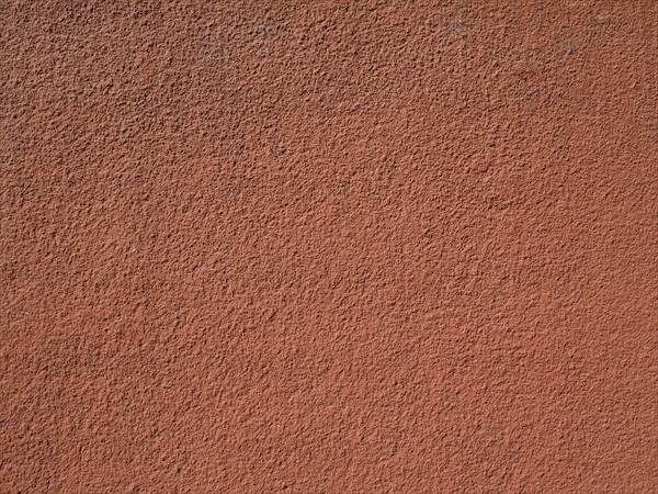 Brown red plaster wall background