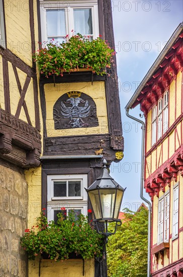 Listed half-timbered house with yellow frames