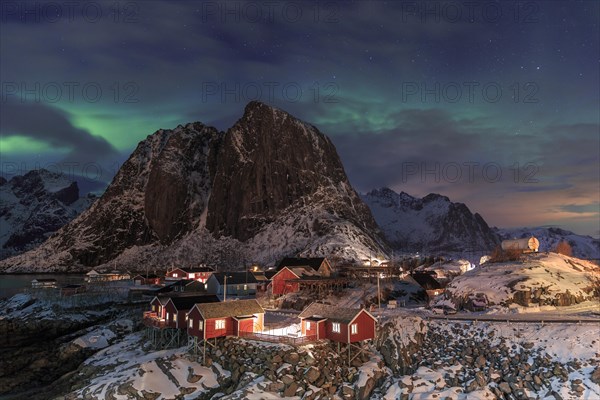 Northern Lights or Aurora Borealis over red rorbuer