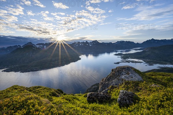 View of Fjord Raftsund and mountains in the evening light