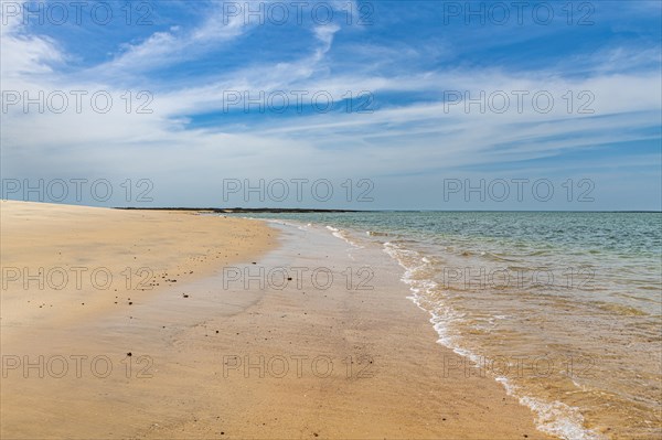 Long sandy beach on a little islet in Marinho Joao Vieira e Poilao National Park