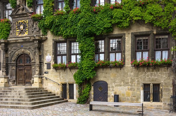 Facade and main portal of the Gothic town hall from the beginning of the 14th century on the market square in the historic old town of the World Heritage city