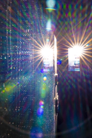 Double Window View Reflected in a Mirror with Sunbeam and Lens Flare in Switzerland