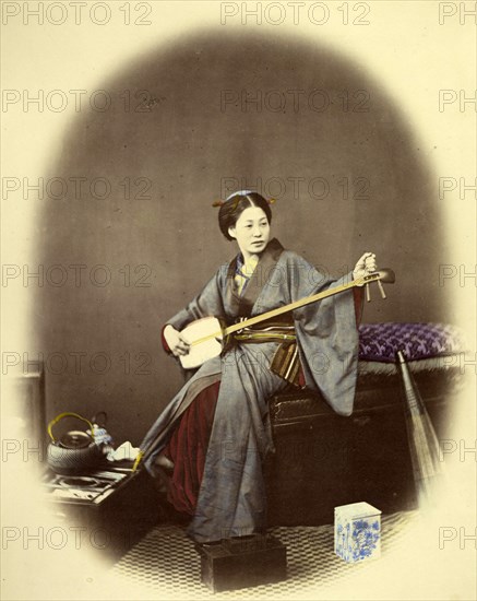 Girl playing the samisen