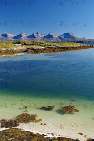 Crystal clear water in a shallow sea bay