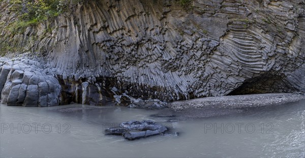 Rock formations of basalt and lava rock in the river park Gole dell' Alcantara