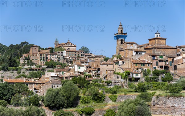 View of Valldemossa mountain village with typical stone houses