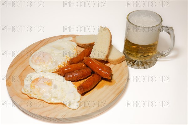 Typical spanish meal of fried eggs with sausage