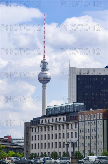 Berlin TV Tower at Alexanderplatz seen from the banks of the river Spree in the government district