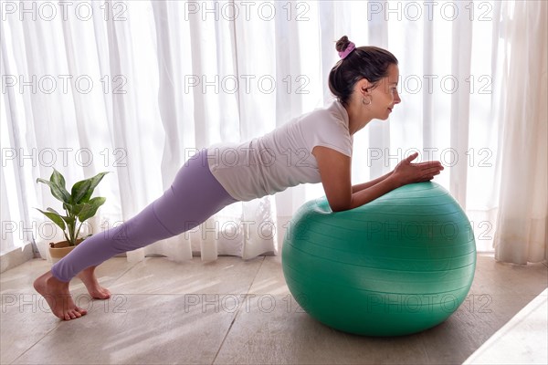 Young woman in a yoga and pilates studio