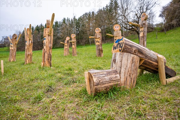 Wooden figures of the Jesus story on Easter path