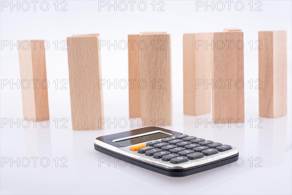 Wooden domino pieces positioned on white background