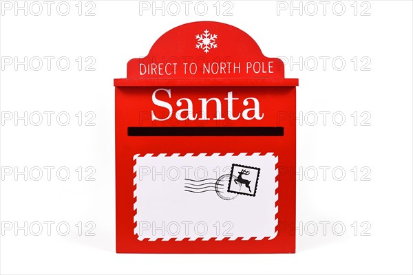 Red santa mail box for Christmas present wishlists on white background