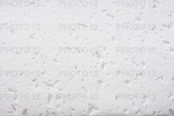 Surface of snow with various traces