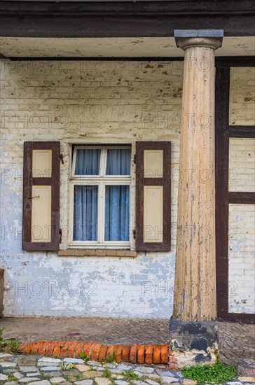 Window and column on the heritage-protected half-timbered building of the Neustaedter Wache