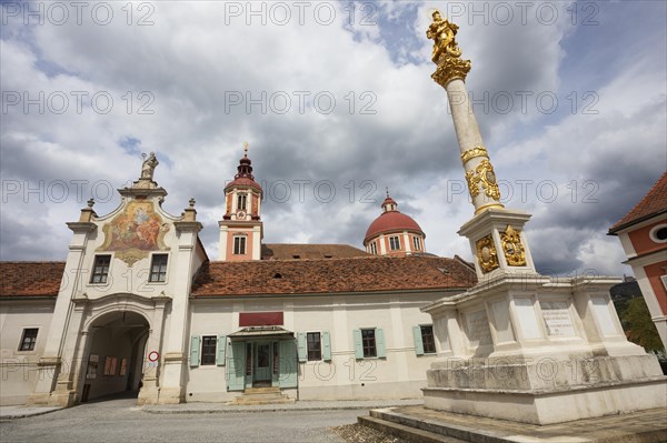 Marian column on the main square with the collegiate church of St. Vitus