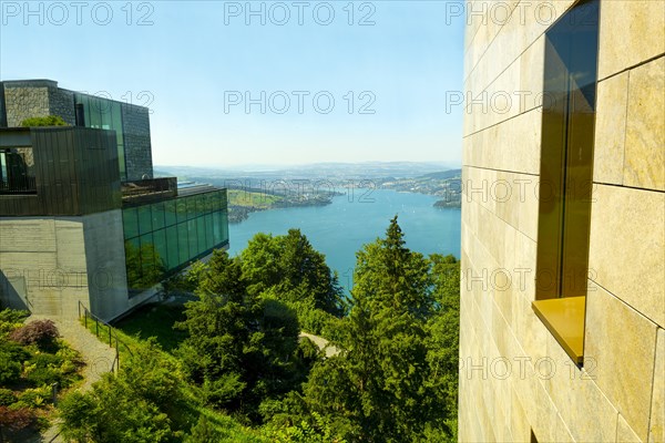 Hotel Five Stars Buergenstock over Lake Lucerne and Mountain in Sunny Day in Buergenstock