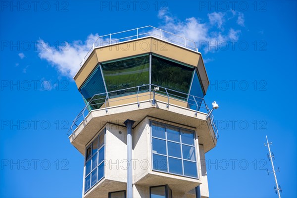 Modern Air Traffic Control Tower with Blue Sky in a Sunny Day in Lugano