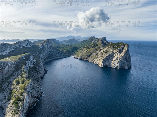 Flight past rocky cliffs and sea