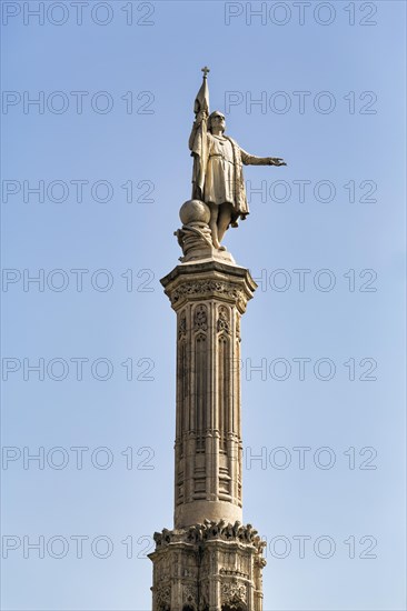 Statue of Columbus in white marble