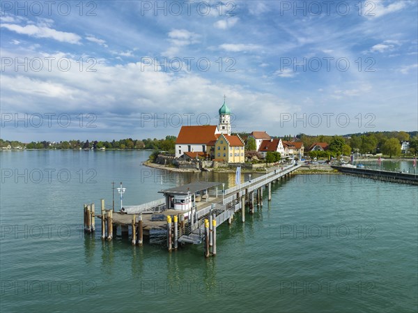 Aerial view of the moated castle peninsula on Lake Constance with the baroque church of St. George